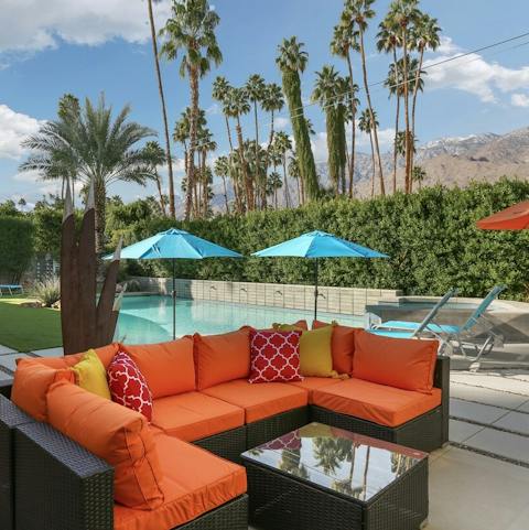 Relax in style on the colourful rattan sofa