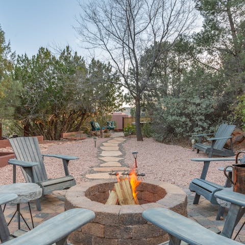 Toast marshmallows by the fire pit on cool desert evenings