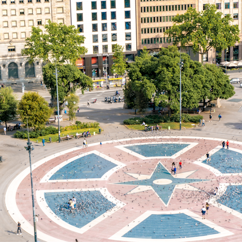 Visit Barcelona's busiest square, Plaça de Catalunya – within walking distance