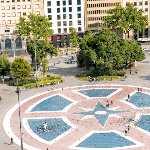 Visit Barcelona's busiest square, Plaça de Catalunya – within walking distance