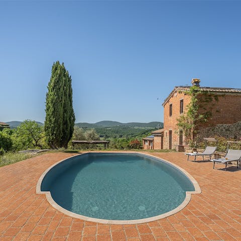 Experience total relaxation while lounging by the pool