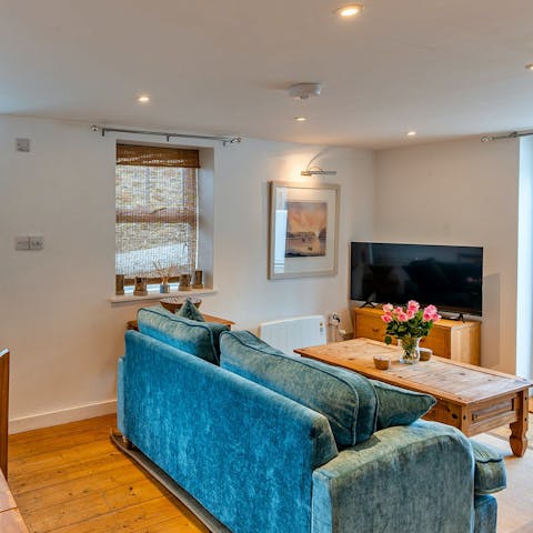 Wind down with cosy evening drinks in the living room