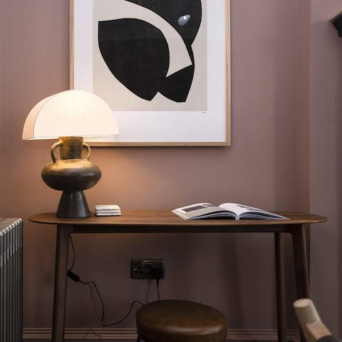 Catch up on work at the living room's desk space
