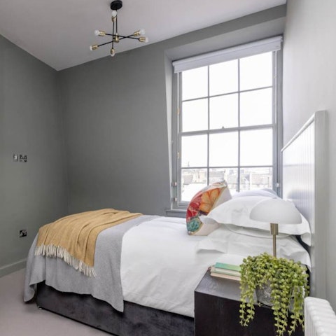 Wake to rooftop views over the city