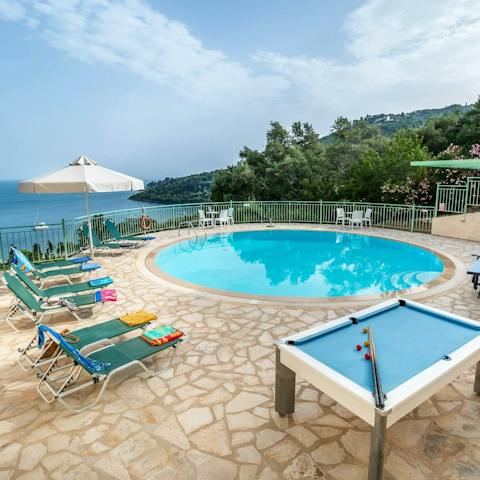 Splash about in the pool or enjoy the views from the comfort of a lounger