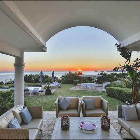Toast unforgettable sunsets from the outdoor lounge