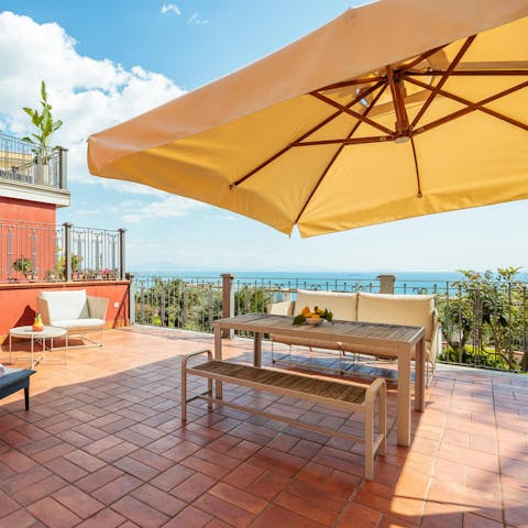 Soak up the sunshine and sea views on the picturesque terrace