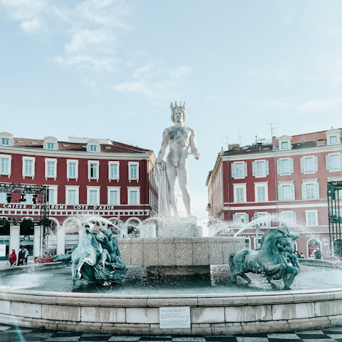 Stroll ten minutes to the Fontaine du Soleil