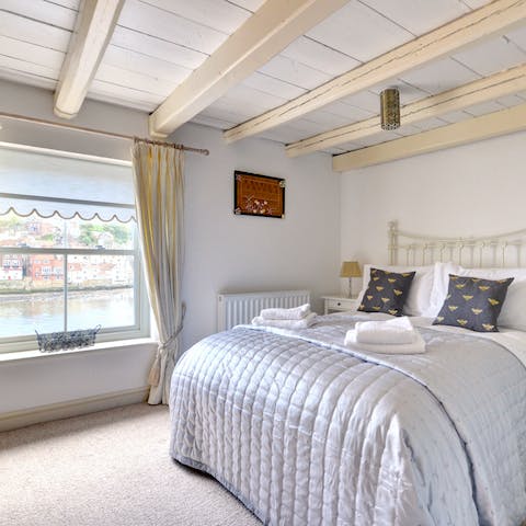 Wake up and admire the stunning views of the town and harbour from bed
