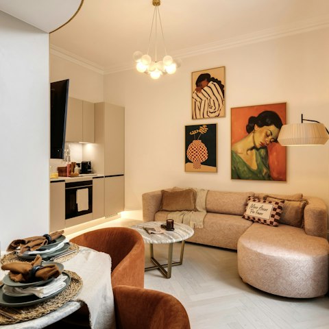Dine or unwind in the stylish living-dining area