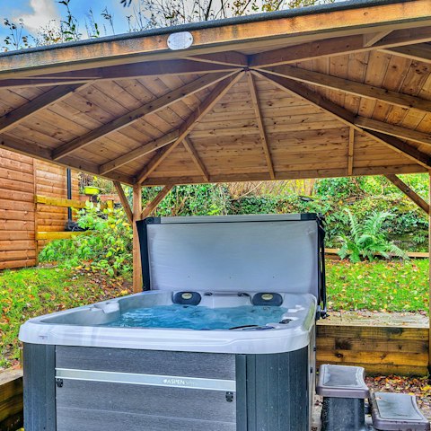 Spend evenings unwinding in the hot tub with a drink or two