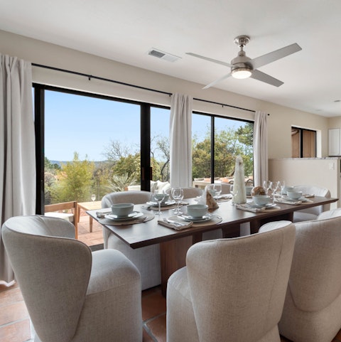 Tuck into a leisurely meal around the dining table