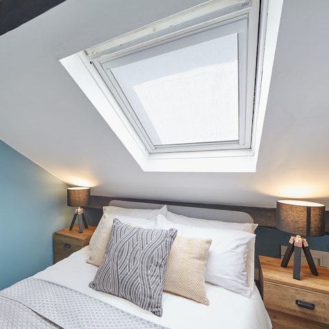 Gaze up at the stars from the bedroom skylight window