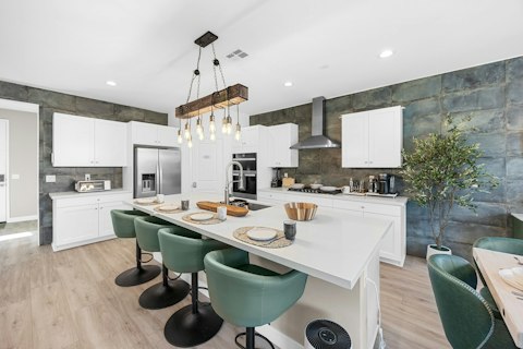 Cook for a crowd in a well-equipped kitchen with island seating