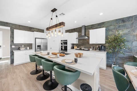Cook for a crowd in a well-equipped kitchen with island seating