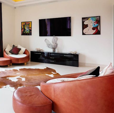 Sink into the squishy leather chairs and watch a show on the flatscreen