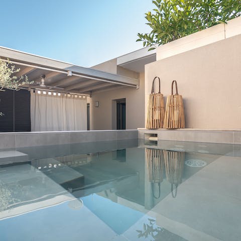 Cool off from the summer heat in the private pool