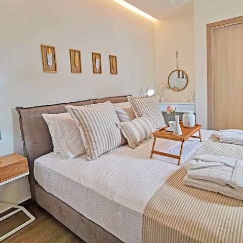 Get a good night's sleep in the comfy and elegant bedrooms