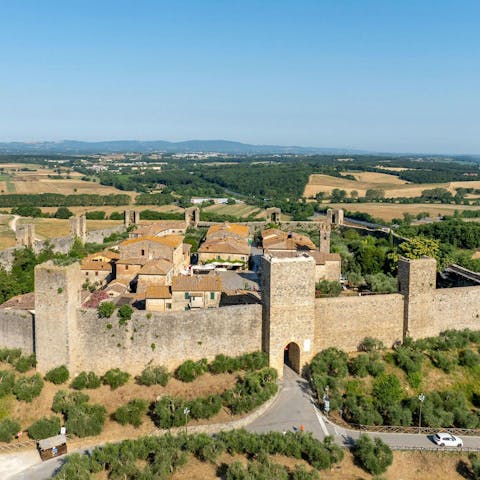 Explore the town of Monteriggioni, under a ten-minute drive away