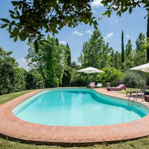 Relax in the Tuscan sun by the private pool