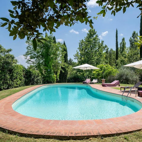 Relax in the Tuscan sun by the private pool