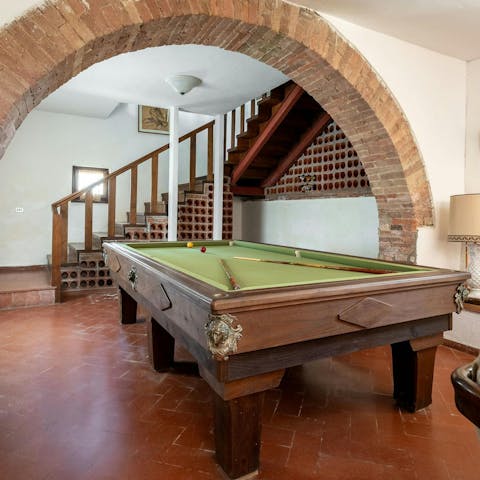 Play some pool or table football after a day trip to Siena