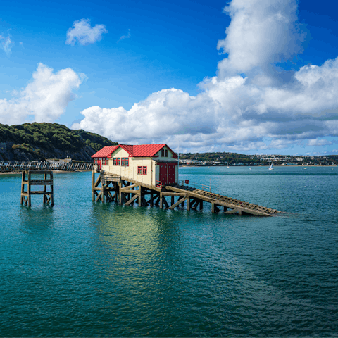 Take a scenic, eleven-minute drive along the coastline to The Mumbles