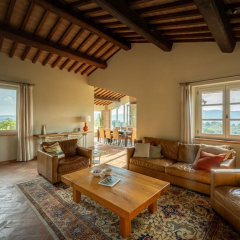 Lounge in the living area, backdropped by panoramic views