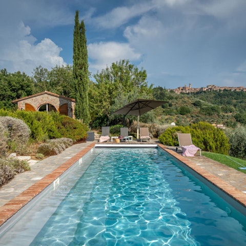 Spend lazy afternoons lounging by the private pool
