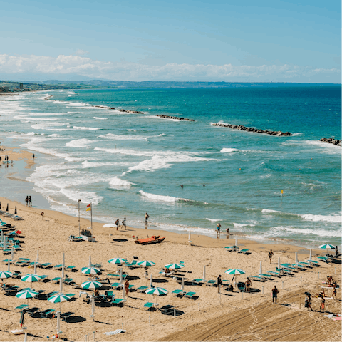 Splash in the shallows of Spiaggia di Atrani – it's an eight-minute drive