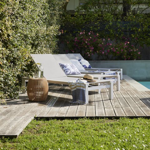 Make the most of the warm weather and lounge beside the pool