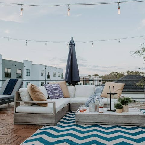 Wind down with sunset drinks on the rooftop patio