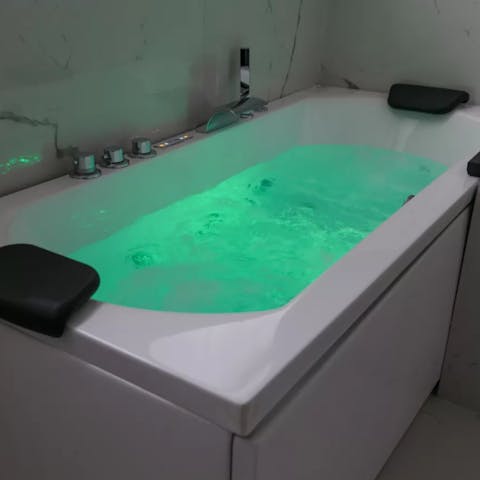 Enjoy a long soak in the spa bath