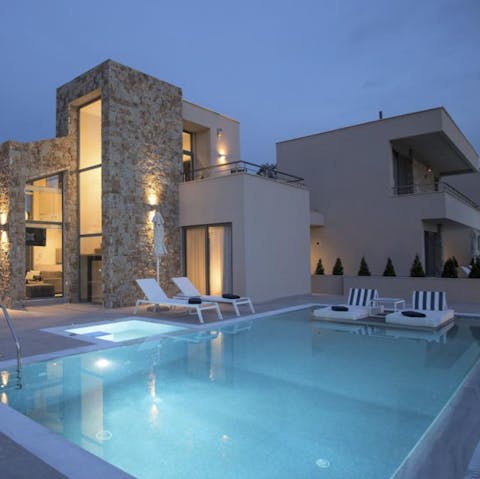 Retreat to the pool when dusk settles for a twilight swim beneath the stars