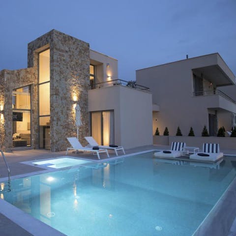 Retreat to the pool when dusk settles for a twilight swim beneath the stars