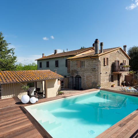 Relax in the Tuscan sun by the private pool