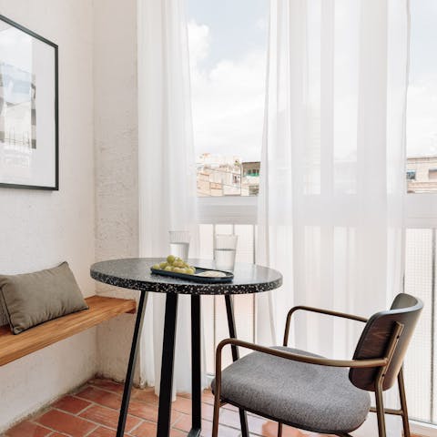 Sip your morning coffee on the private balcony