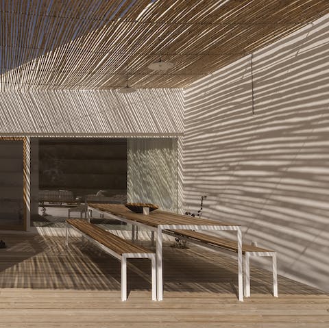 Enjoy relaxed barbecue dinners at home around the rustic, picnic-style dining table