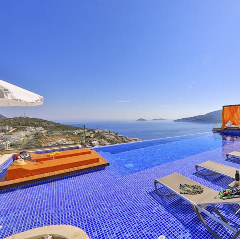 Sunbathe on the tanning deck or swim in the pool