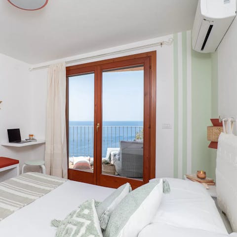 Wake up to views of the water from every bedroom