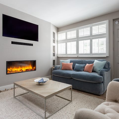Curl up by the living room's fire with a glass of wine