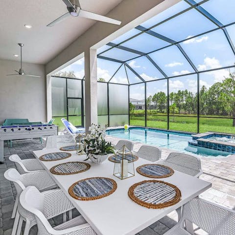 Dine and unwind outside by the private pool
