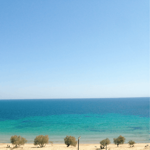 Discover beaches, tavernas and markets in Massouri, just a three-minute drive away