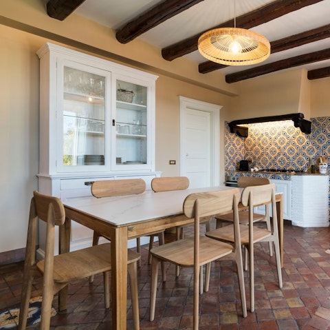 Prepare a feast with local ingredients in the kitchen and dining area