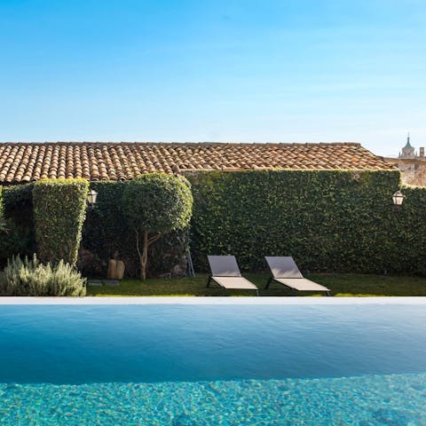 Sunbathe or stay cool by the private pool