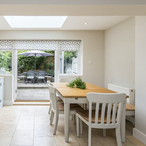 Fling open the French doors and enjoy a hearty breakfast at your dining table
