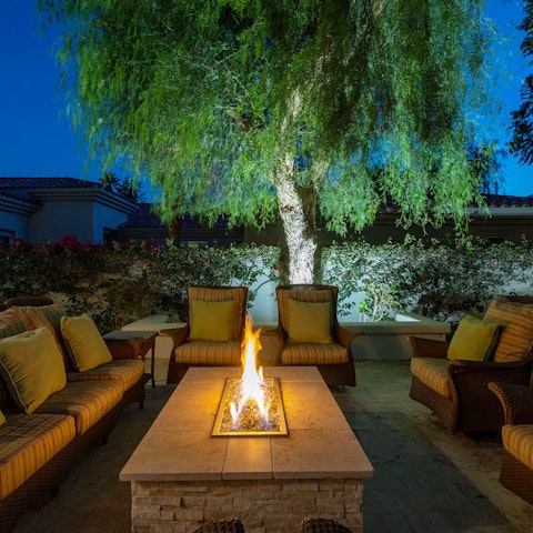 Gather for magical sunset drinks around the fire-pit