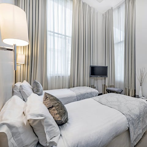 Wake up to Kensington views from the bedrooms' floor-to-ceiling windows