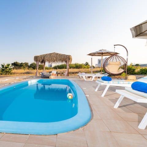 Plunge into the private swimming pool to escape the Greek heat