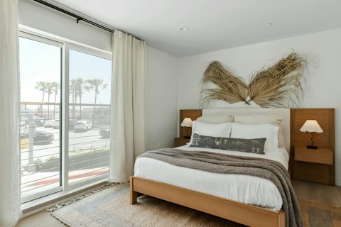 Open the Juliet balcony to feel the Pacific breeze